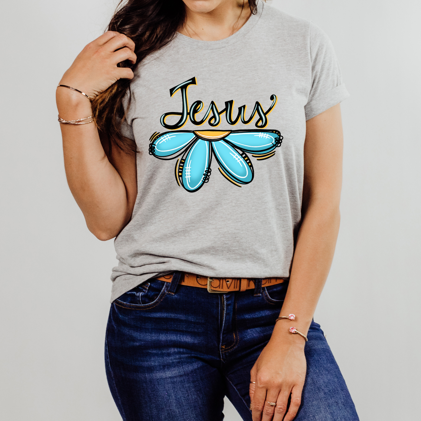 Jesus above Bright Flower on Bella Canvas Tee
