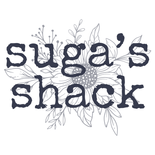 The text 'suga's shack' in a dark navy blue rustic font, overlaid on a light gray line art illustration of a sunflower and leaves, on a solid white background.